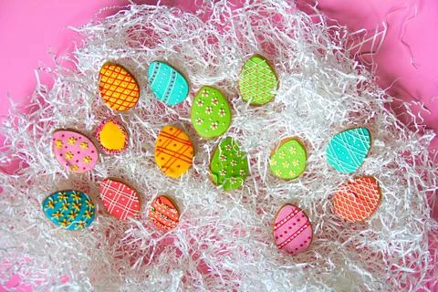 Colorful Easter Egg Cookies background Stock Photos