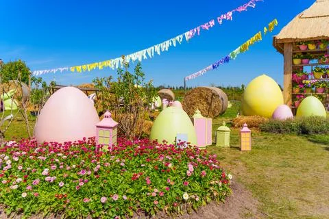Colorful Easter Egg Display in a Lively Spring Garden Setting 스톡 사진