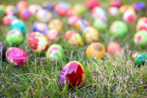 Colorful Easter egg in the grass Foto stock