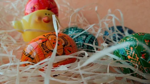 Colorful easter eggs among straw Stock Footage 103846625