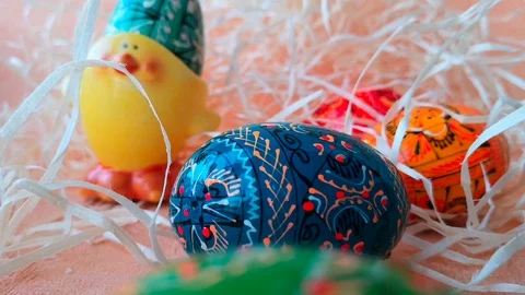 Colorful Easter eggs among straw Stock Footage 103847544