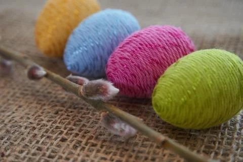 Colorful easter eggs and willow branch Stock Photos