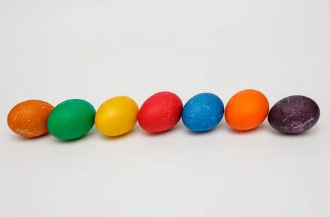 Colorful easter eggs arranged in a row Stock Photos