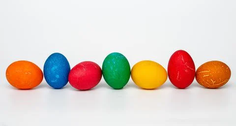 Colorful easter eggs arranged in a row Stock Photos