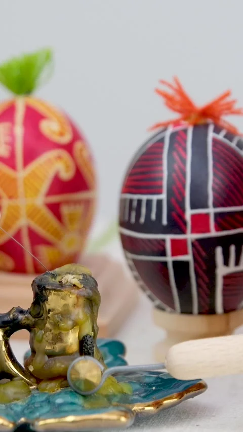 Colorful Easter eggs background Egg Waxing Tool with List Stock Footage 247359077