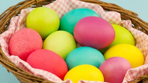 Colorful Easter eggs in a basket in 4K. Stock-Footage 233455886