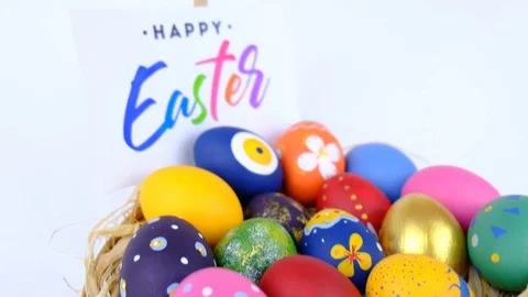 Colorful Easter Eggs in Basket Stock Footage 128306590