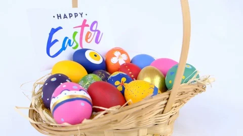 Colorful Easter Eggs in Basket Stock Footage 128307565