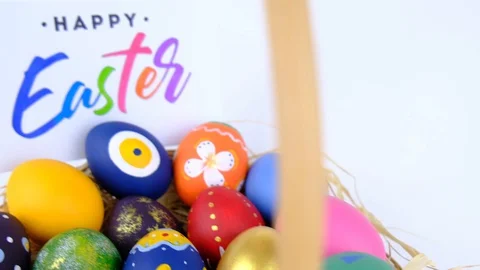 Colorful Easter Eggs in Basket Stock Footage 128310035