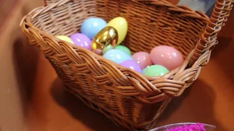 Colorful Easter Eggs in Basket with One Golden Egg Видео 63008292