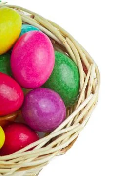 Colorful easter eggs in basket Stock Photos
