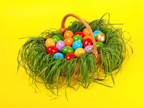 Colorful easter eggs in basket Stock-Fotos