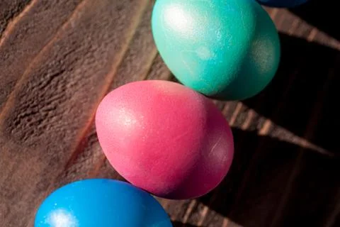 Colorful easter eggs in basket a Stock Photos