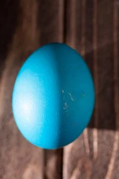 Colorful easter eggs in basket a Stock Photos