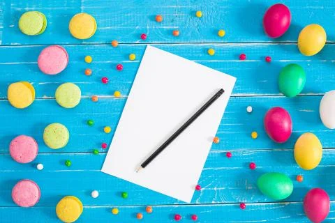 Colorful easter eggs on blue rustic wooden background Foto stock