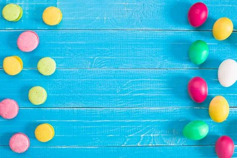 Colorful easter eggs on blue rustic wooden background Foto stock