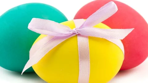Colorful Easter eggs with a bow in 4K Stock Footage 233453664