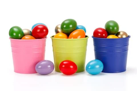 Colorful easter eggs in buckets Stock Photos