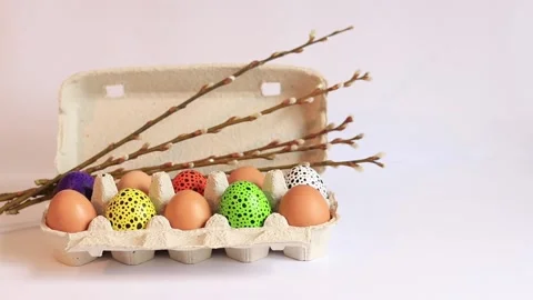 Colorful Easter eggs in a cardboard box Stock Footage 237820294