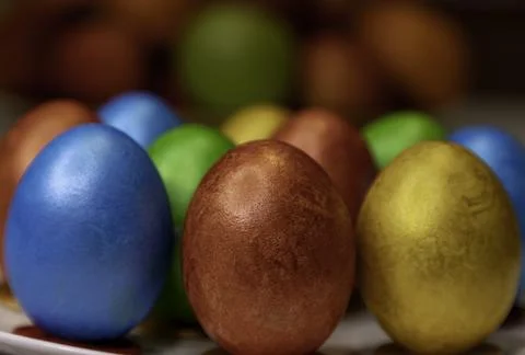 Colorful Easter eggs close-up. Preparation for Easter. Painted Easter eggs. Stock Photos