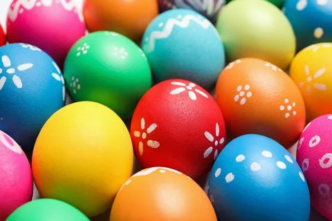 Colorful Easter eggs with different patterns as background, closeup 库存照片
