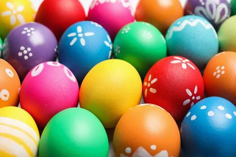 Colorful Easter eggs with different patterns as background, closeup 库存照片