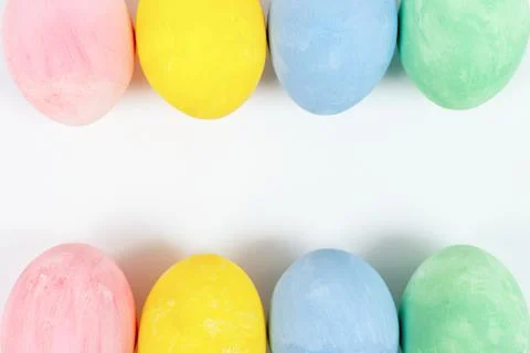Colorful Easter eggs double border over a on white background. Row of Easter  Stock Photos