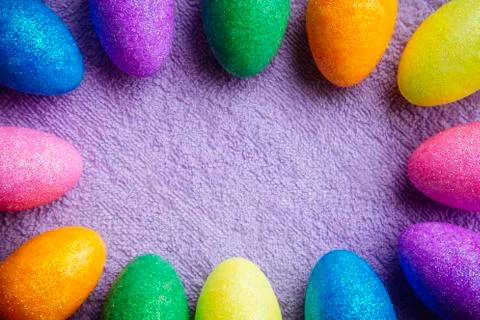 Colorful Easter Eggs on a fabric background. Creative concept Foto stock