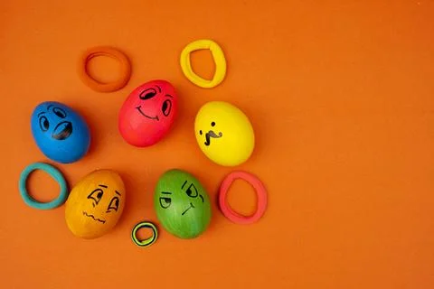 Colorful Easter Eggs With Faces Showing Different Emotions.. Stock Photos