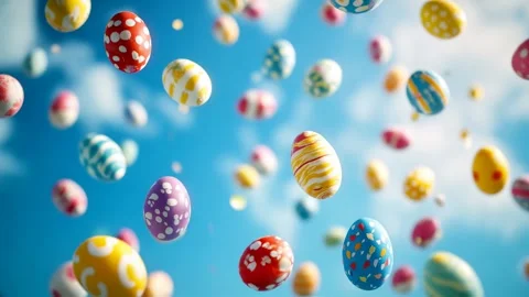 Colorful Easter Eggs Falling Against a Blue Sky Stock Footage 300281834