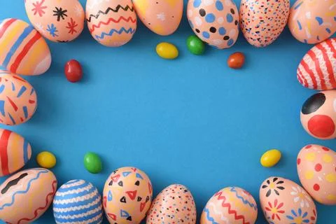 Colorful Easter Eggs Frame on Blue Background Foto stock