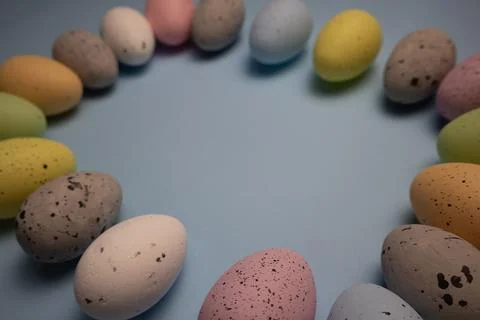 Colorful Easter eggs frame close up Stock Photos