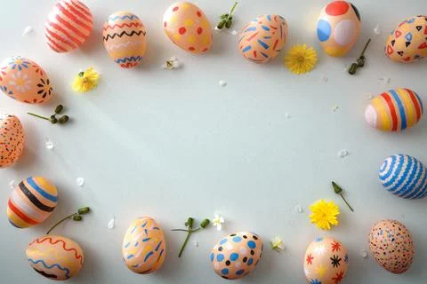 Colorful Easter Eggs Frame with Spring Flowers Stock Photos