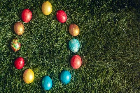 Colorful Easter eggs on the grass Stock Photos