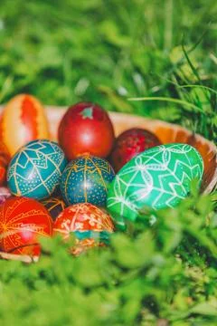 Colorful Easter Eggs in Grass Stock Photos