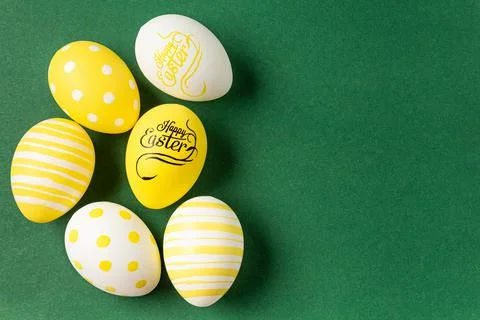 Colorful easter eggs on a green background Stock Photos