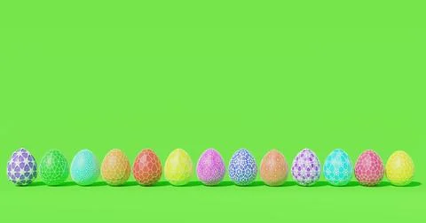 Colorful Easter eggs on a green background. Easter. Copy space. Horizontal Stock Photos