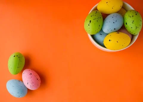 Colorful Easter eggs on orange Foto stock