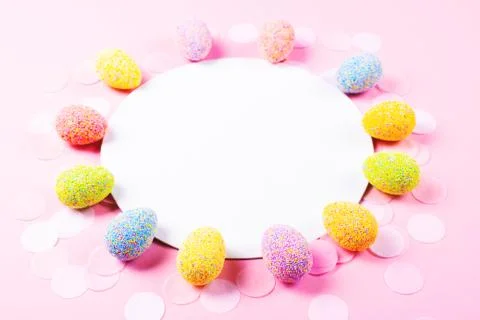 Colorful easter eggs on pink background. Stock Photos
