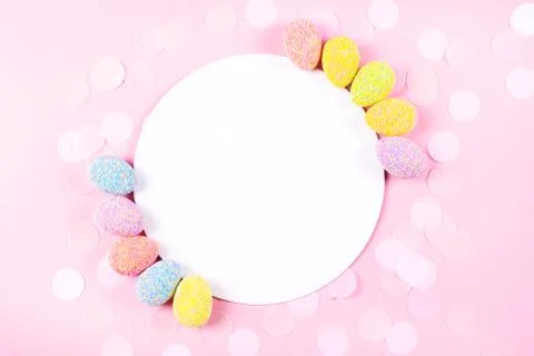 Colorful easter eggs on pink background. Stock Photos