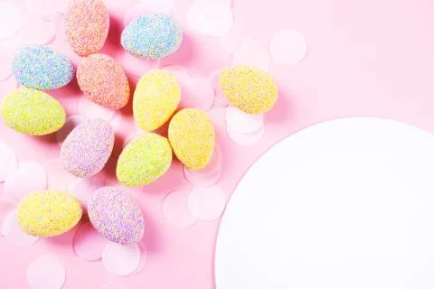 Colorful easter eggs on pink background. Stock Photos