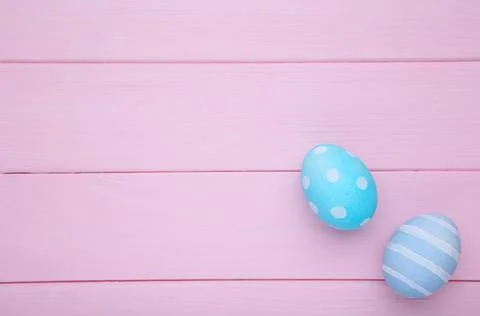 Colorful easter eggs on a pink background Stock Photos