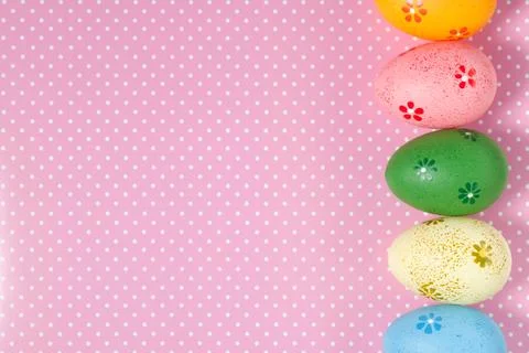 Colorful easter eggs on pink background Stock Photos