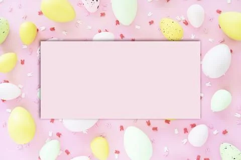 Colorful Easter eggs on pink background. Egg hunting. Foto stock