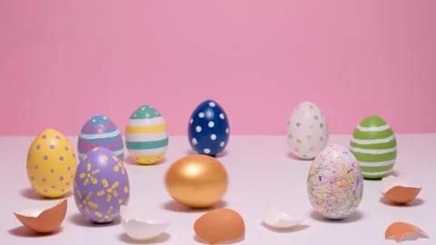 Colorful Easter eggs on the pink table. Eggs colored on a pink background. Stock Footage 152145636