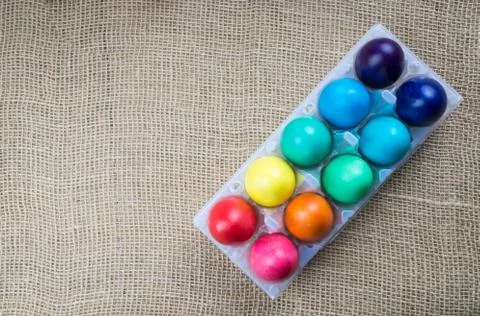 Colorful easter eggs in plastic box Stock Photos