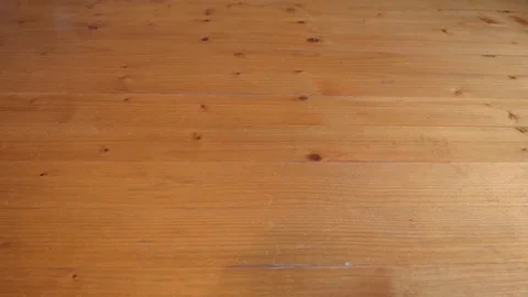 Colorful easter eggs is put on the table. One egg added later. Video stock 74576960