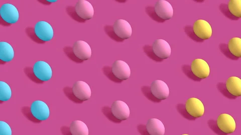 Colorful Easter Eggs rotating in rows in seamless loop on pink background Stock Footage 150046013