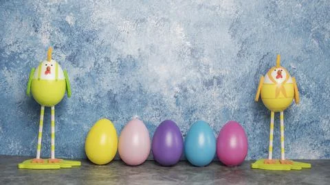 Colorful Easter eggs in a row and eggs in form of chicks with long legs on a  Stock Photos