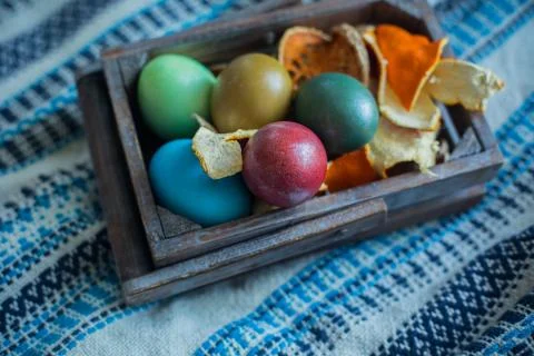 Colorful Easter eggs on rustic background Stock Photos